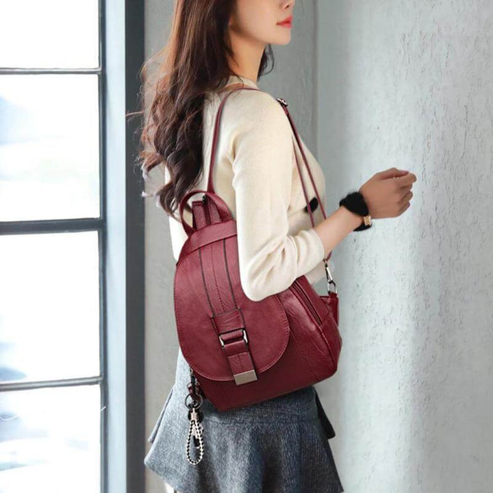 Fashion accessory: women's water-resistant leather backpack with anti-theft features.