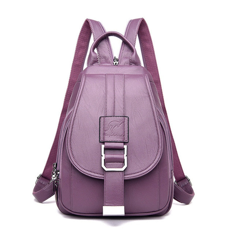 Spacious interior of a women's water-resistant leather backpack, organized for essentials.