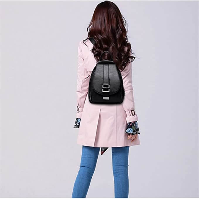 Detail of the zipper and hardware on a women's water-resistant sheepskin leather backpack.
