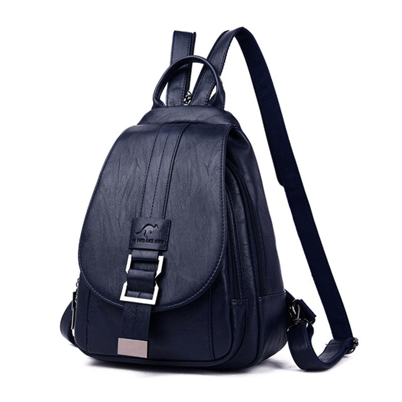 Close-up on the embossed logo of a women's premium water-resistant leather backpack.