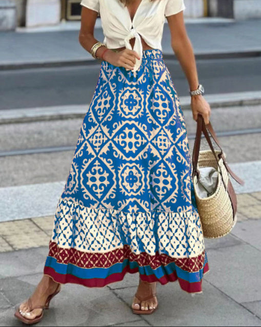 Bohemian style women's maxi skirt, printed fabric, elegant flowing fringes, casual.