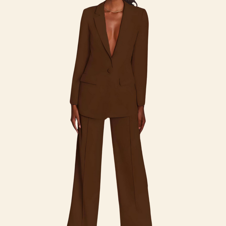 Stylish women's work outfit featuring a structured blazer and comfortable wide leg business pants.