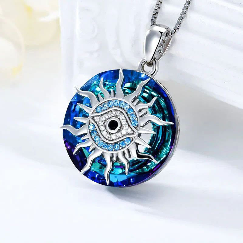 Elegant Women's Evil Eye Necklace with shimmering gemstone. A symbolic talisman for protection & strength.