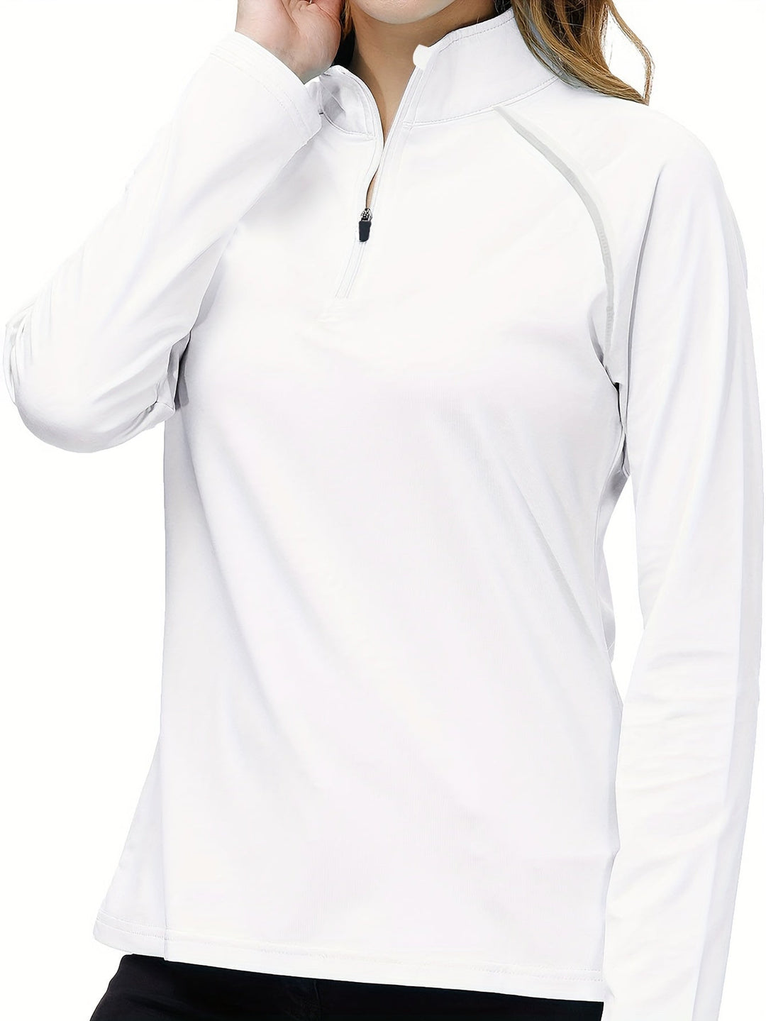 Athletic women's long sleeve workout shirt, versatile gym & running gear.