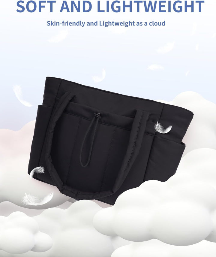 Quilted tote bag standing upright, showcasing its structured yet soft design