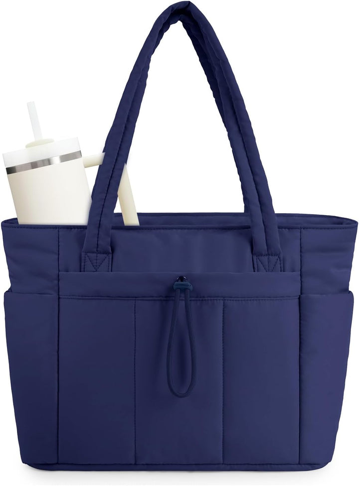 Women's high-capacity quilted puffer tote, laptop sleeve, cup holder & secure compartments.