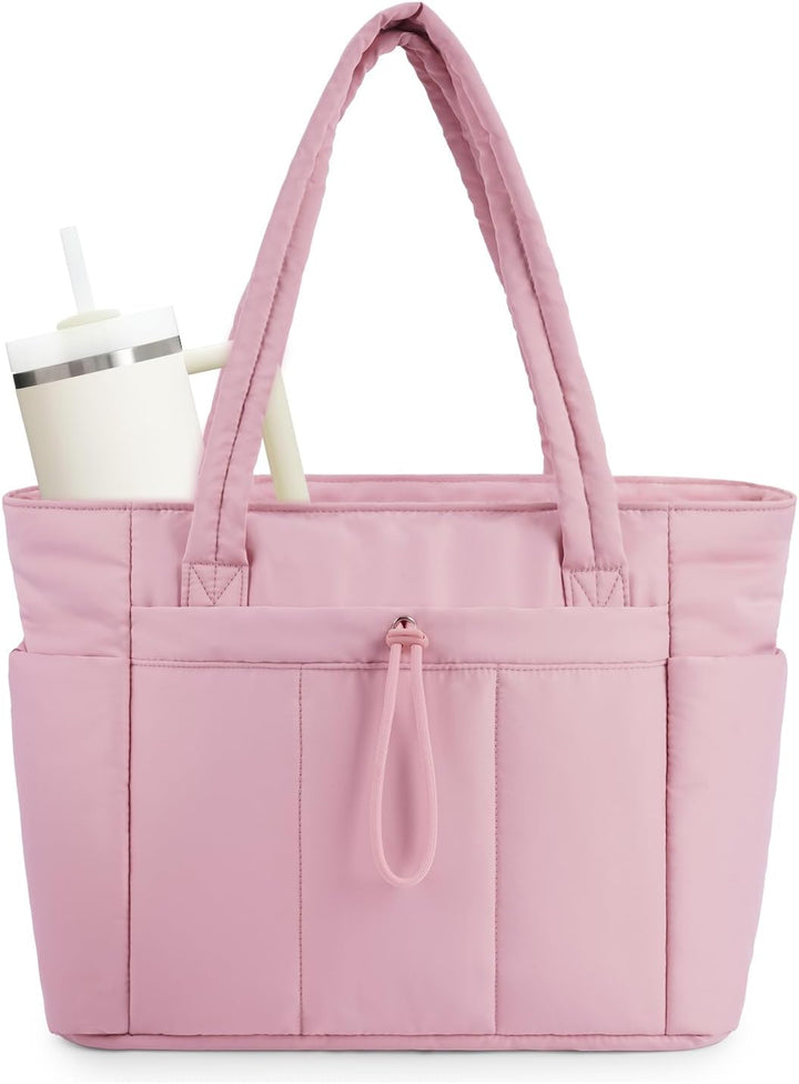Lifestyle shot of the quilted tote bag complementing a contemporary outfit