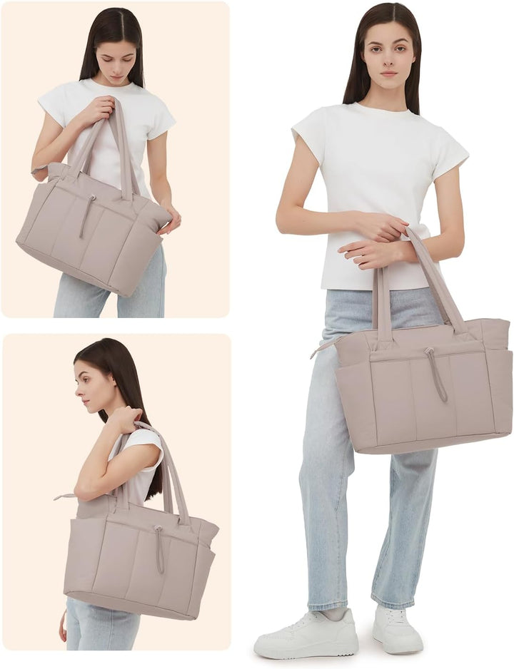 Fashionable women's puffer shoulder bag with laptop sleeve, cup holder & spacious interior.
