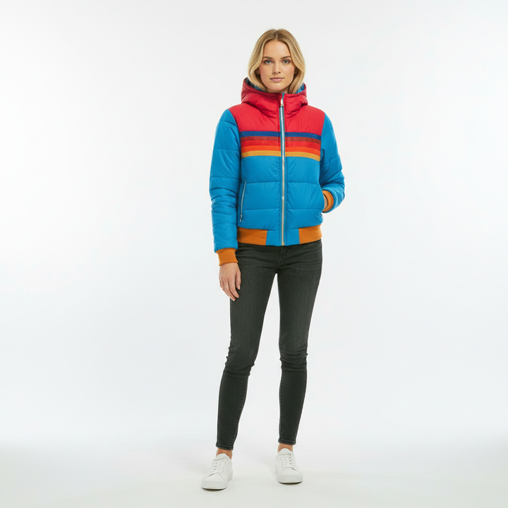 Casual women's outerwear: a striped and quilted winter jacket with a protective hood