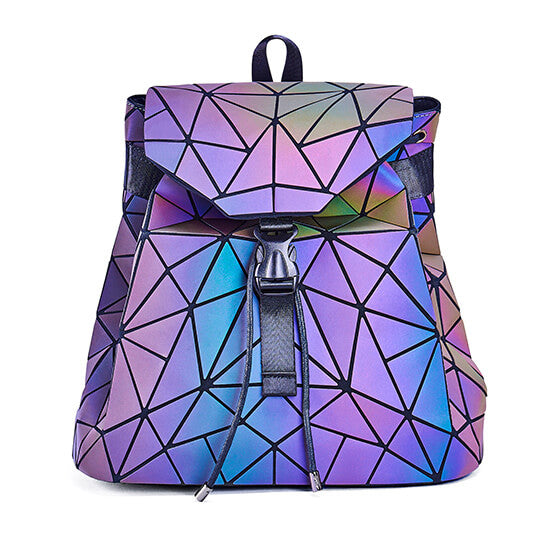 Stylish women's luminous backpack in action, reflecting light with its geometric pattern