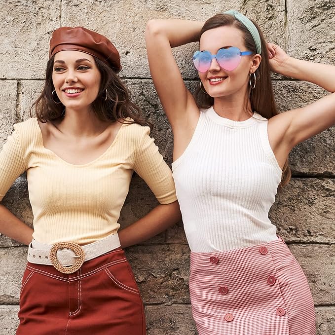 Fashionable women's clear heart sunglasses without a frame, featuring a subtle pink tint, ideal for parties and trendy looks.