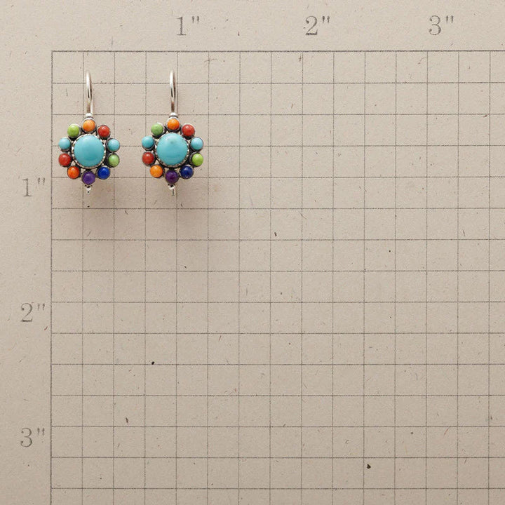 Colorful round turquoise earrings for women, featuring a unique boho-inspired design; a chic fashion accessory.