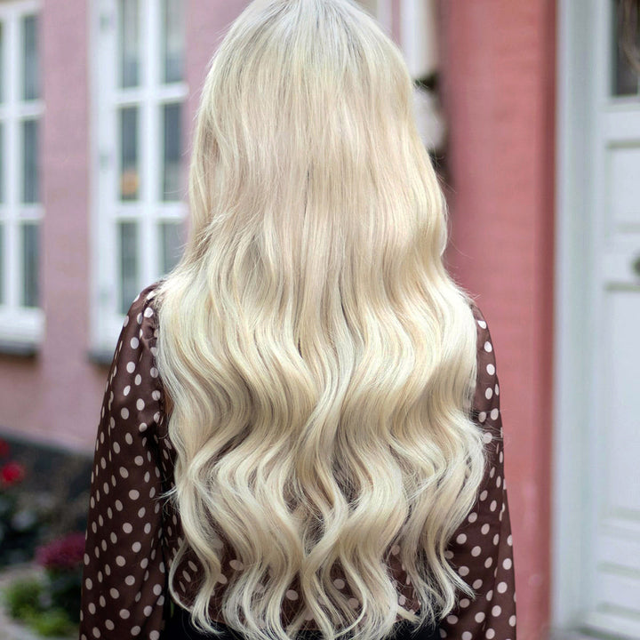 Light Ash Blonde 60B seamless hair extension strip, invisible weft, ideal for natural hair volume & beauty.