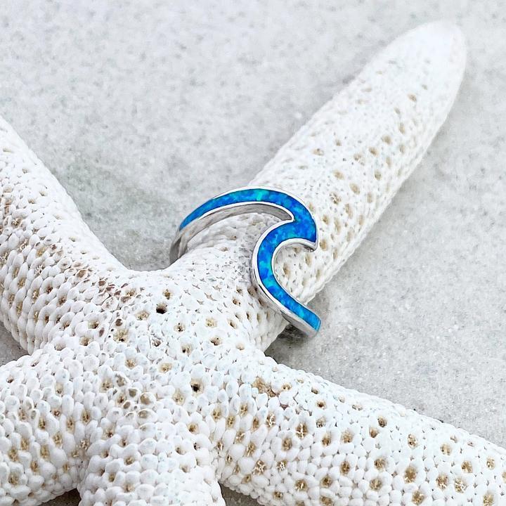 Women's silver sea wave ring, a unique blue opal gemstone ring, stylish and nature-inspired.