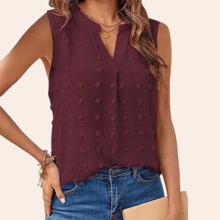 Elegant black sleeveless women's blouse, airy and comfortable for any occasion