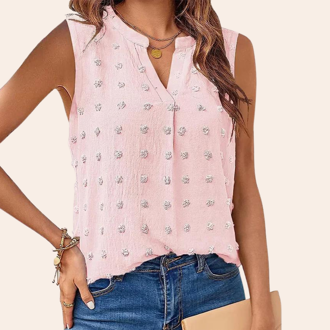Professional women's sleeveless blouse in navy blue, offering a chic and lightweight option
