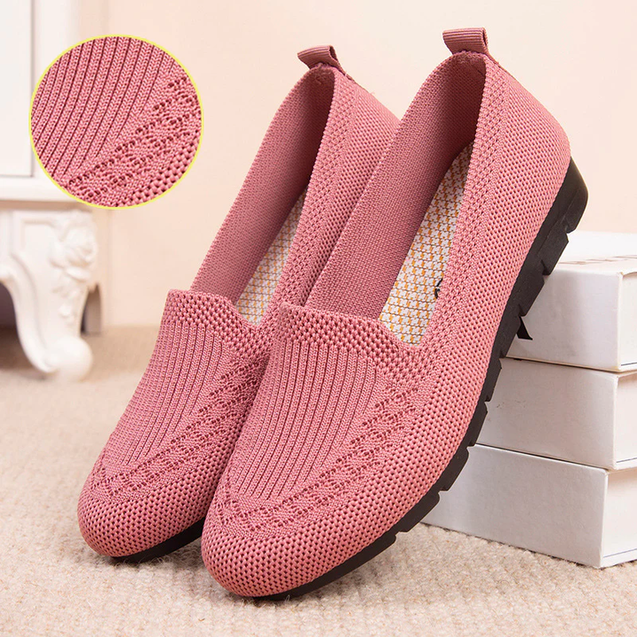 Breathable women's slip-on walking shoes with arch support, perfect for casual summer style.