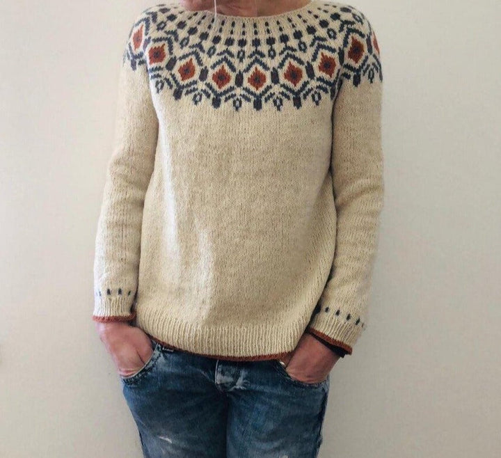 Warm & elegant knitted sweater for women, ideal for autumn style, offering cozy winter comfort.