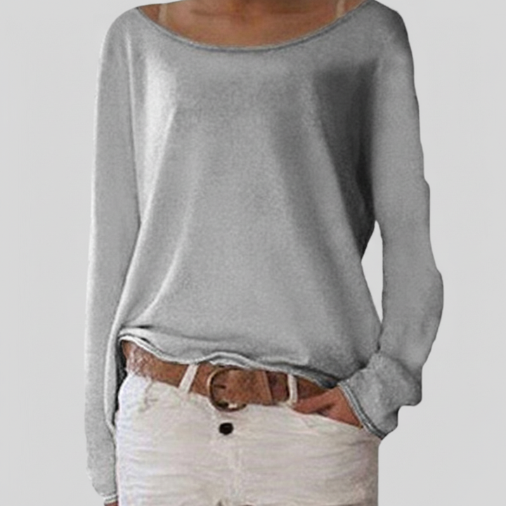 Detail of the soft knit fabric on a women's polyester blend crewneck sweater