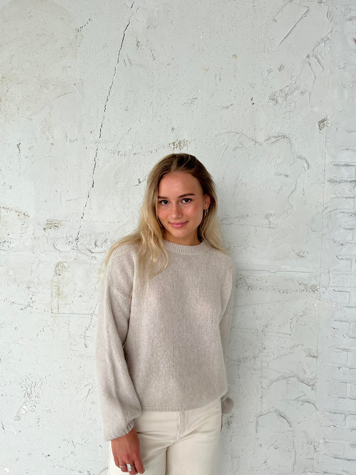 Cozy loose fit women's pullover, soft touch fabric, great for relaxed style.