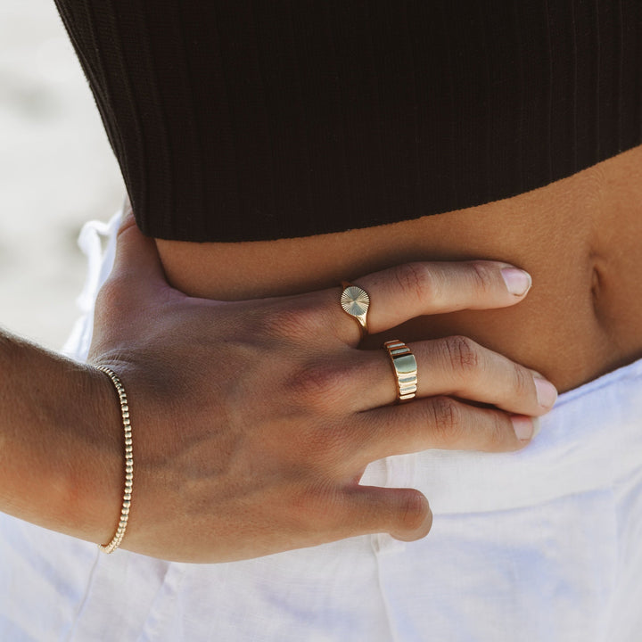 Delicate gold & silver Solara Sun Signet Ring for women, perfect hypoallergenic gift.