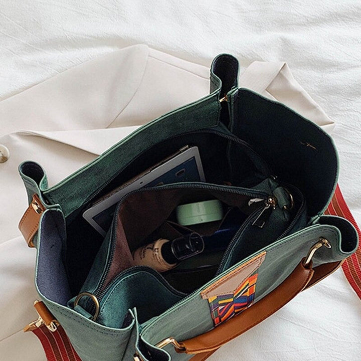 Durable PU leather women's tote bag for everyday carry. Stylish shoulder bag, great for work or travel fashion.