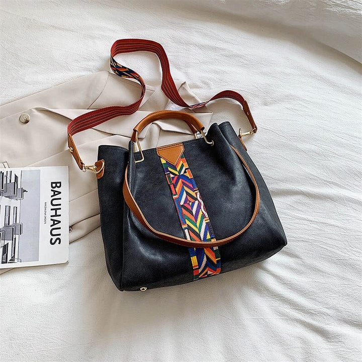 Everyday carry women's PU leather tote bag, spacious & durable. A stylish shoulder bag for all your daily needs.