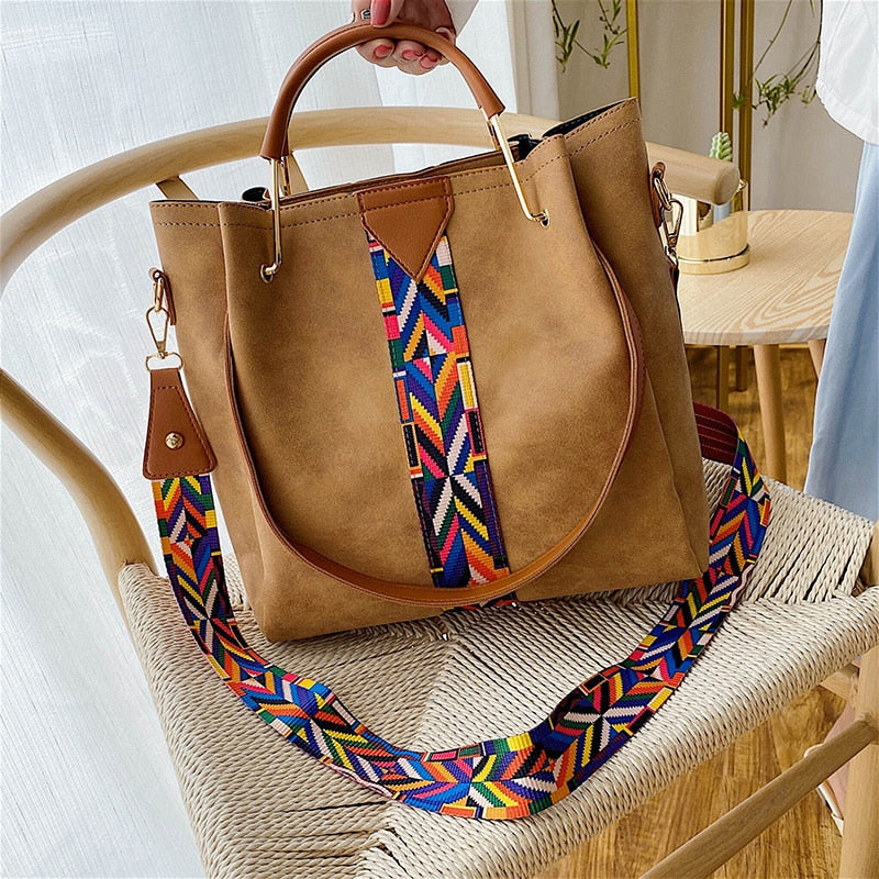 Smooth PU leather women's tote, spacious interior for daily use. Durable & stylish everyday shoulder bag.