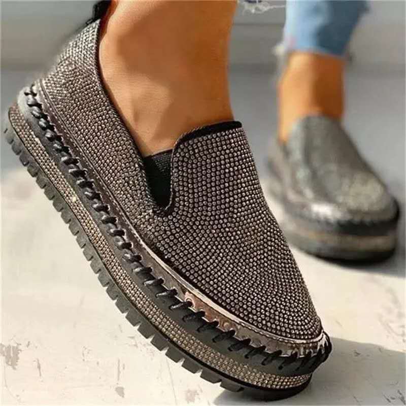 Elegant women's rhinestone slip-on loafers with a comfortable flat sole, ideal for casual chic fashion.