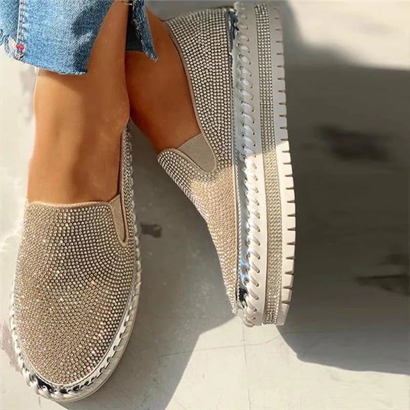Versatile women's sparkling flat loafers with cushioned comfort, blending elegance with casual wear.