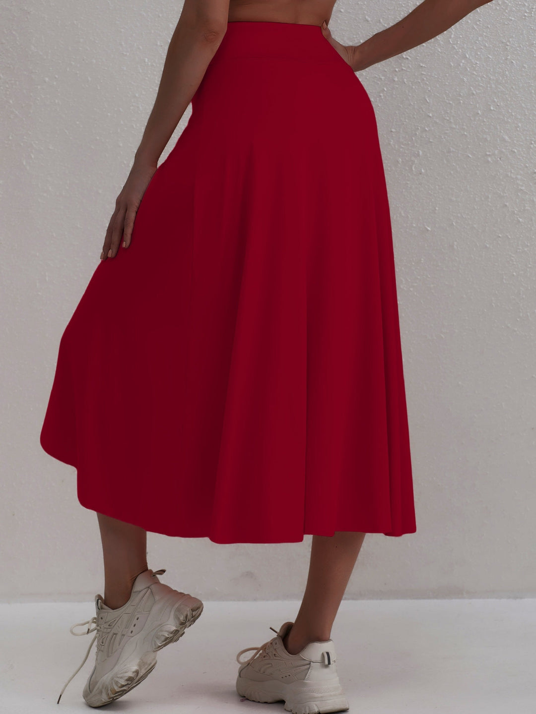 Women's sporty asymmetric high-waisted skirt. Perfect for activewear & leisure.