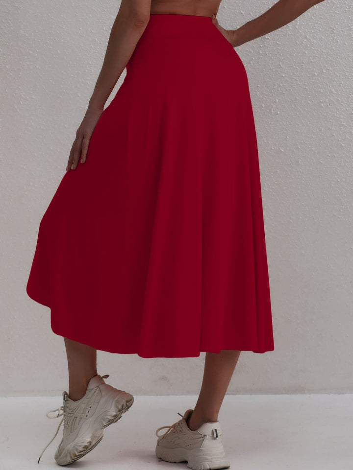 Women's sporty asymmetric high-waisted skirt. Perfect for activewear & leisure.