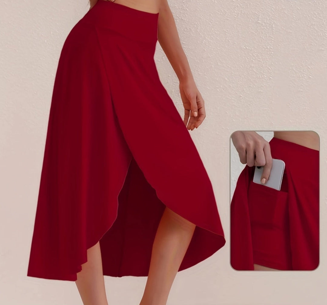 Stylish women's athletic A-line asymmetric skirt with high waistband. Ideal for everyday & travel.