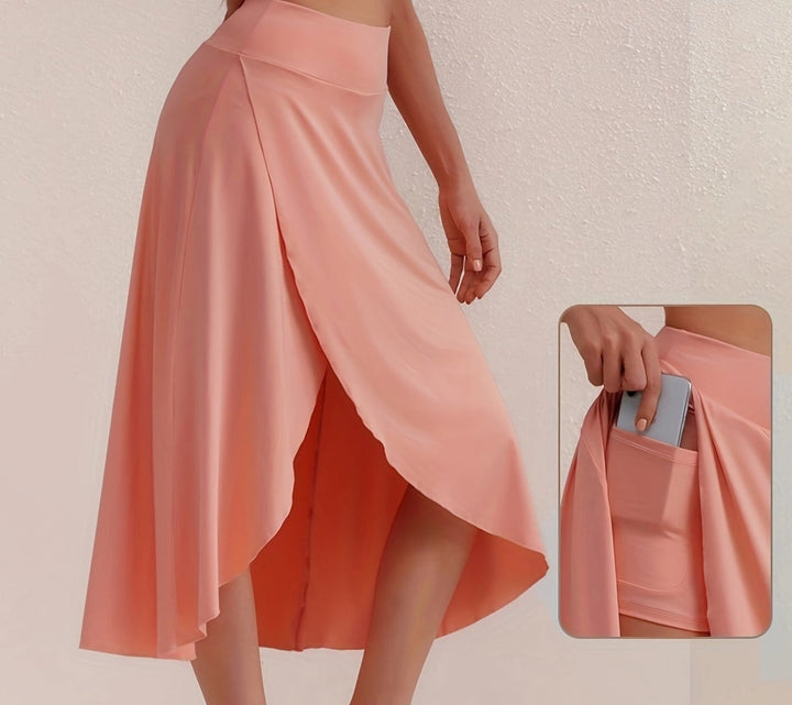 Dynamic women's calf-length asymmetric sporty skirt. High-waisted activewear essential for leisure.