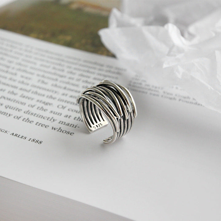 Stylish women's adjustable layered silver ring, versatile sterling silver jewelry for daily wear.