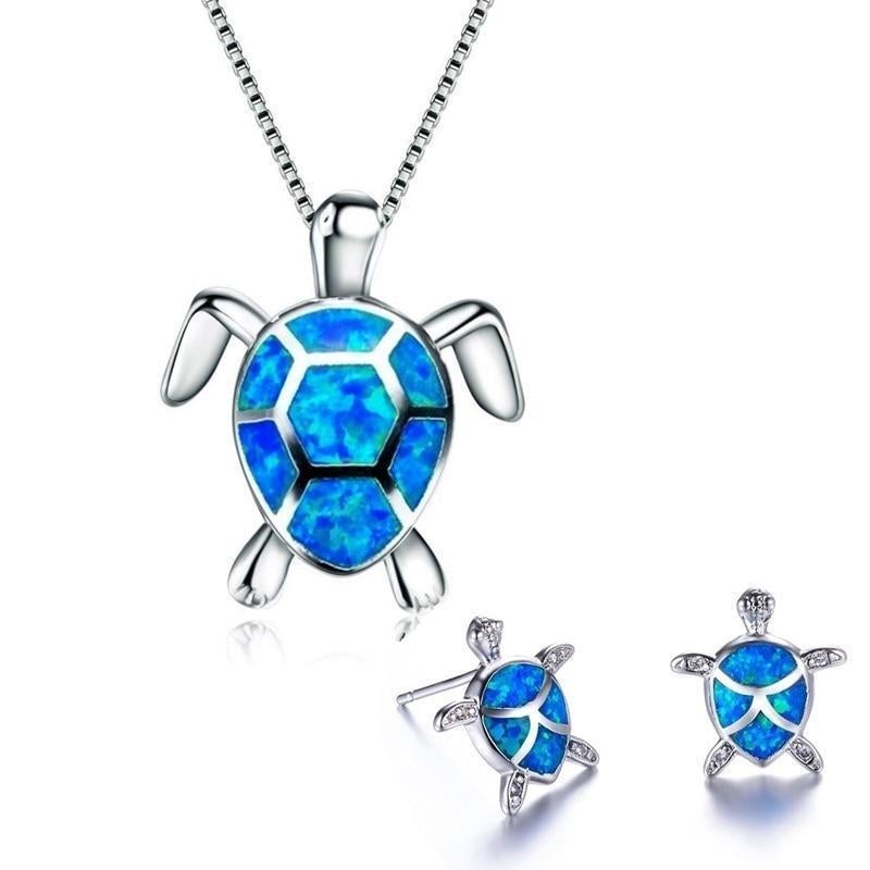 Ocean-themed sterling silver turtle necklace & iridescent opal earrings. Animal jewelry gift.