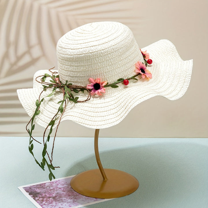 Bohemian-style women's straw sun hat, with unique floral and fruit embellishments.