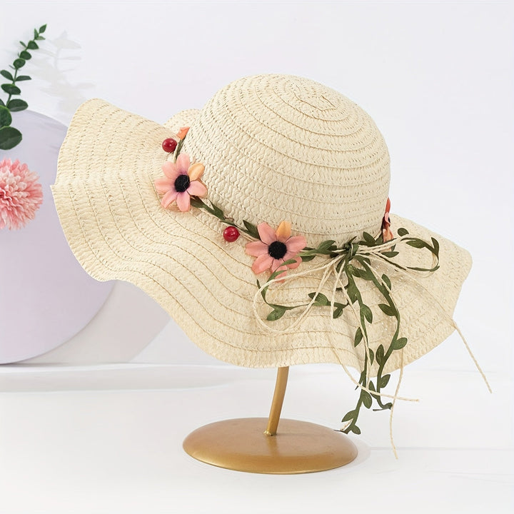 Lightweight women's straw hat, perfect for summer sun, with charming floral & fruit decor.