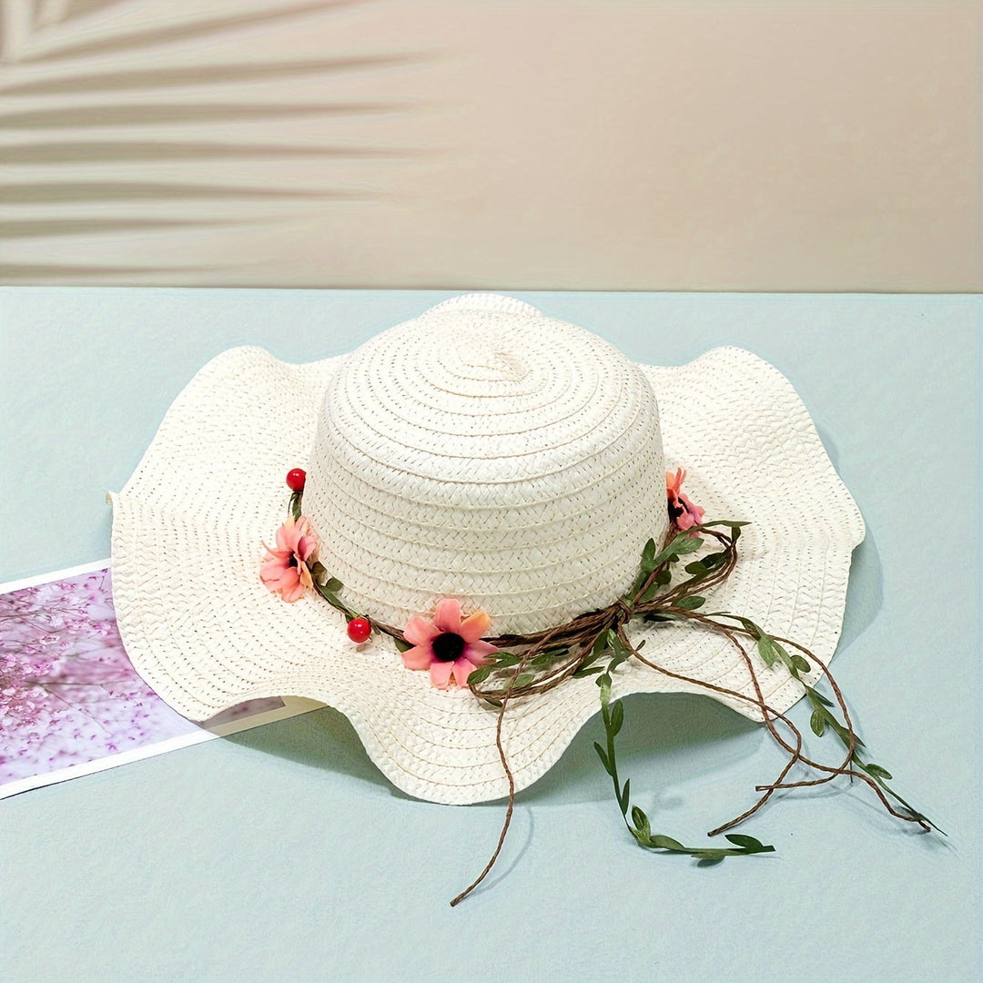 Full view of women's summer straw hat, showcasing vibrant floral & fruit designs.