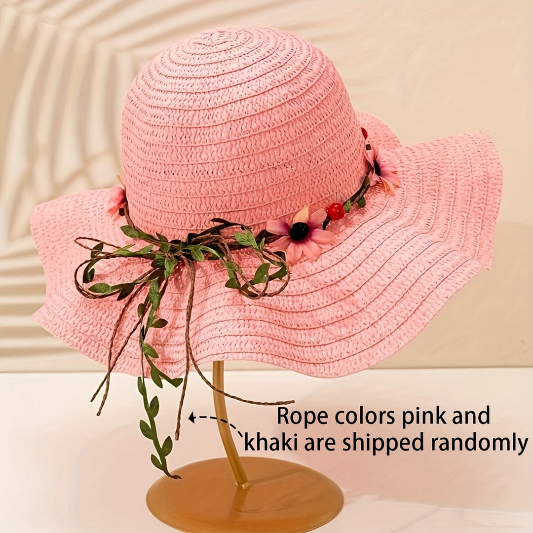Bohemian straw hat for women, featuring elegant floral & fruit details, a chic summer accessory.