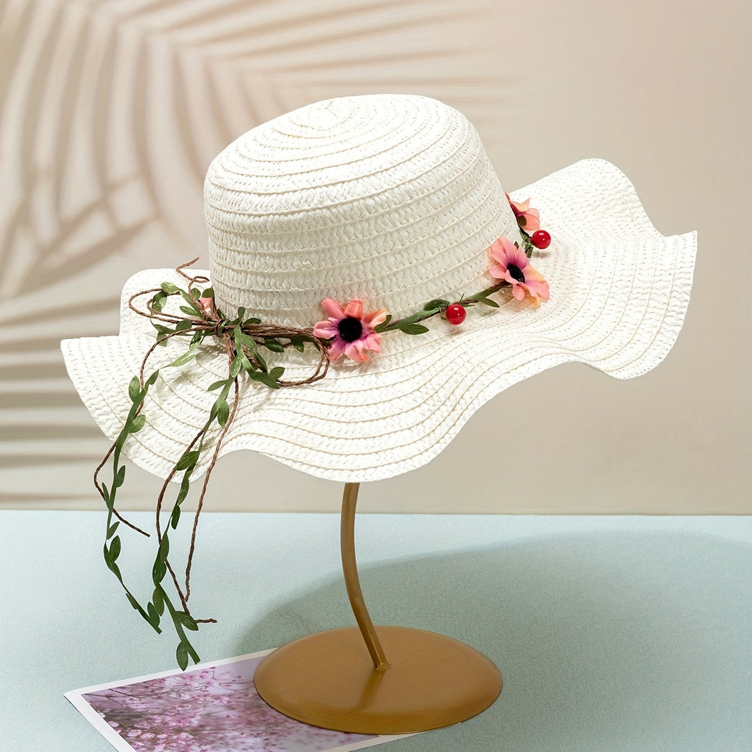 Elegant women's straw sun hat with colorful floral & fruit accents, great for summer garden parties.