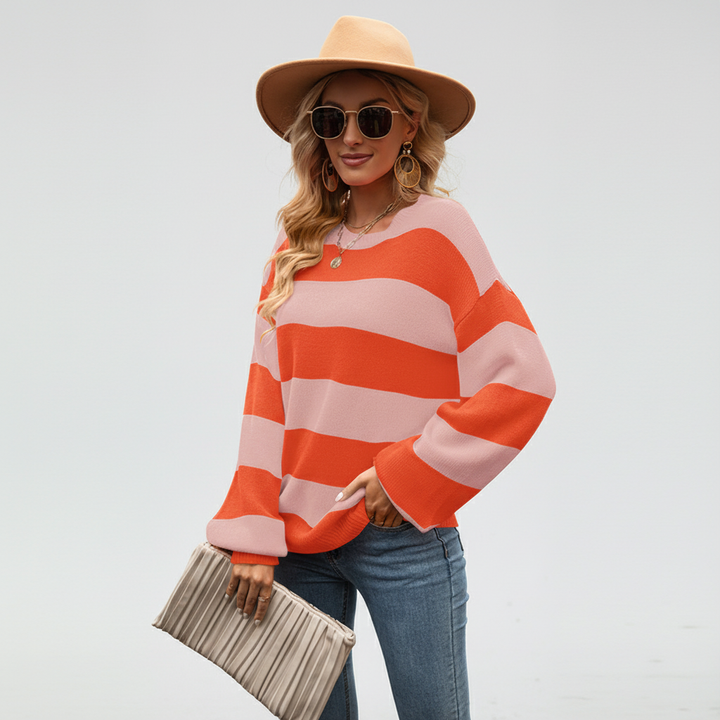 Close-up of women's striped knit cardigan sweater, showcasing the soft cotton blend fabric