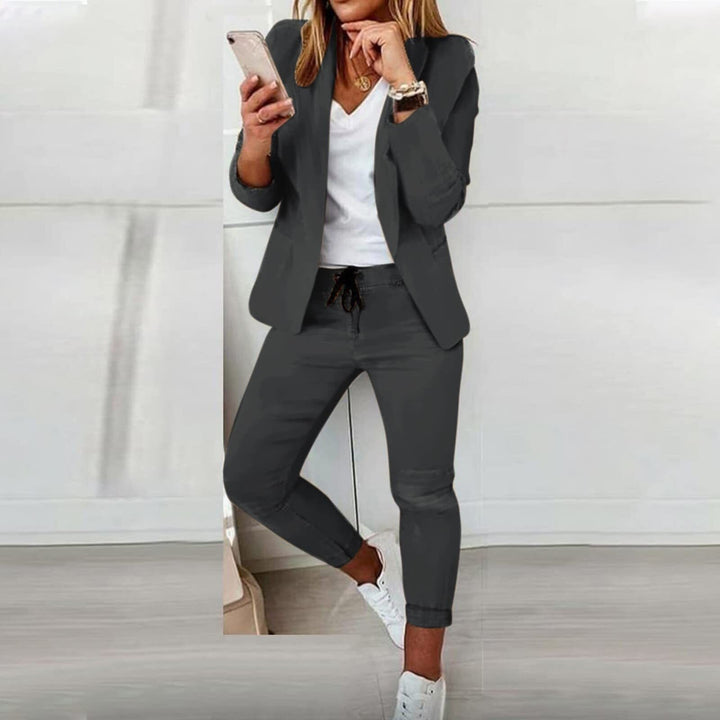 Versatile women's fall/spring fashion set: an open seam blazer & soft drawstring pants for a chic, casual look.