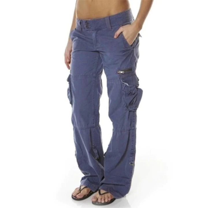 Versatile women's cargo pants in a vibrant red, featuring practical pockets & a comfortable fit for casual wear.