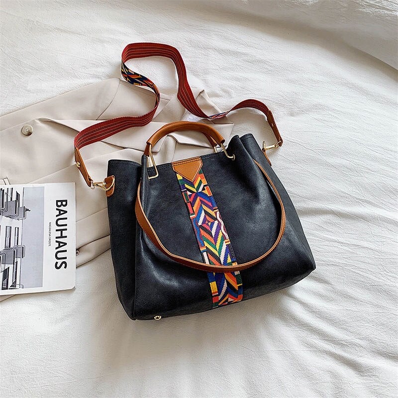 Spacious PU leather tote in a neutral tone, ideal for daily essentials