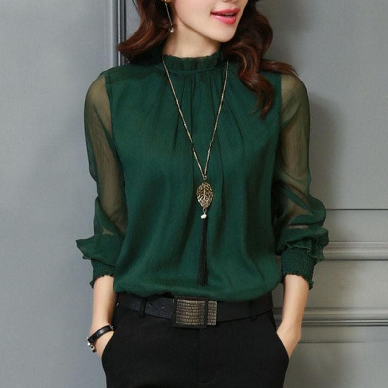 Fashionable women's solid color blouse with ruffle details & sheer sleeves. Ideal for spring and summer elegance.