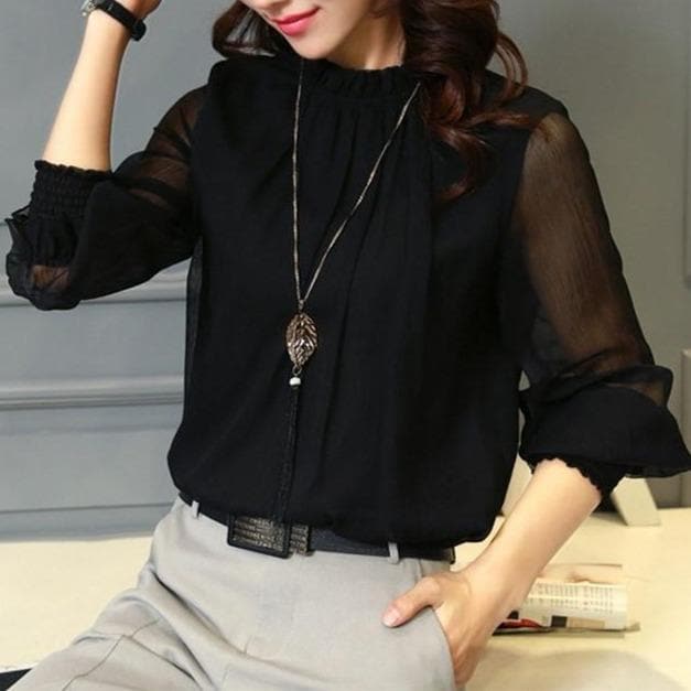 Stylish women's ruffle blouse with sheer long sleeves, a stand collar, and a flowing design for modern elegance.