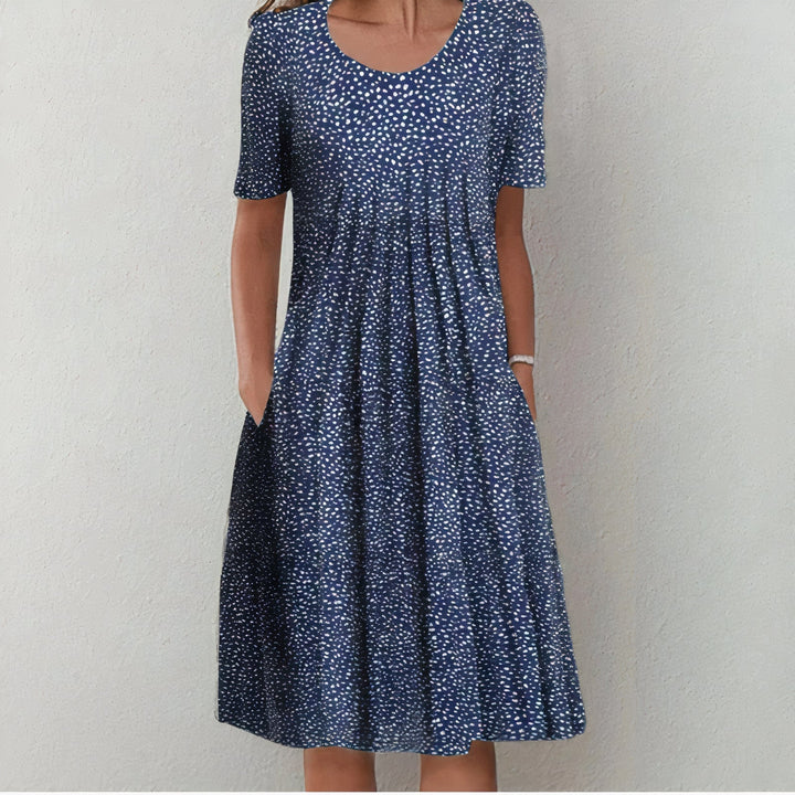 Elegant women's summer day dress. Comfortable cotton midi for casual wear or vacation. Lena style.