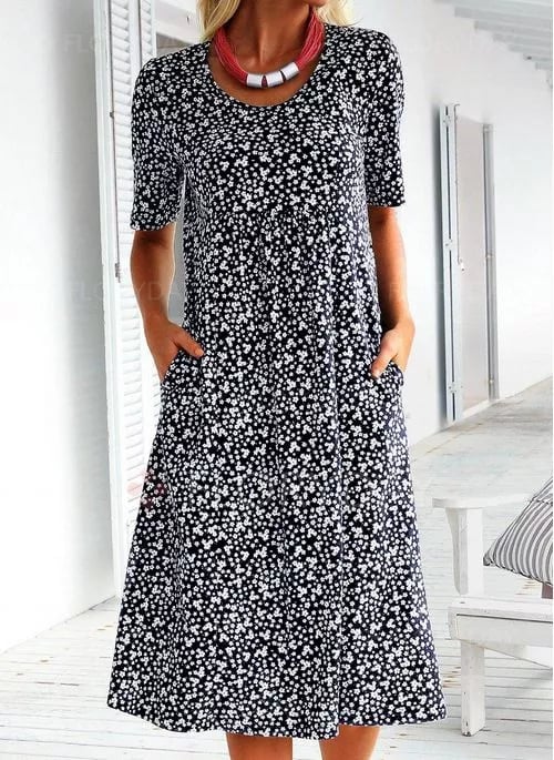 Comfy women's vacation dress featuring a beautiful floral print, perfect for sunny beach days.