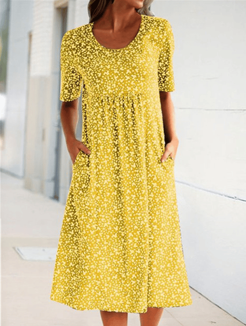 Effortless women's floral print spring/summer dress, a comfy and stylish choice for any occasion.